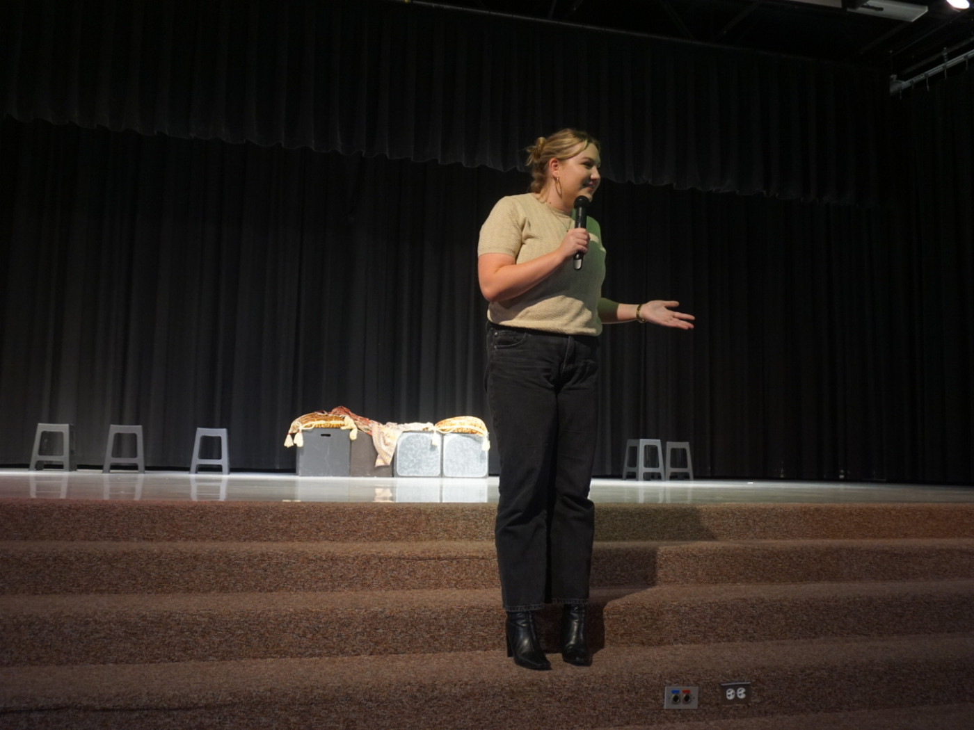 Emily introducing the show at Springville Middle School. Taken by Bryce Romleski 